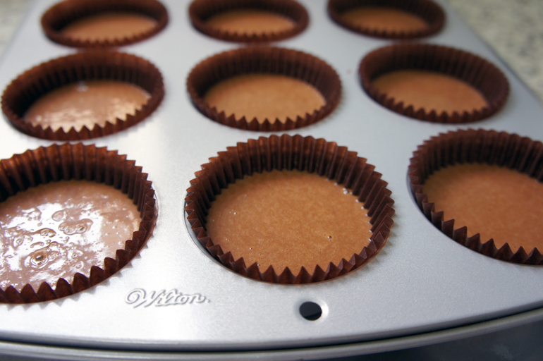 Cupcake com cobertura de chantininho dentro do post